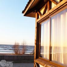 Photo of Solar Gard Quantum window tinting installed on a beachfront home