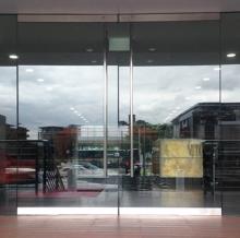 Photo of Solar Gard Stainless Steel window tinting installed on a retail storefront