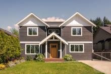Photo of Solar Gard TrueVue window tinting installed on a two-story home