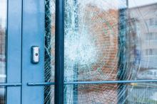 Photo of Solar Gard Armorcoat Clear Safety window tinting after attempted break-in