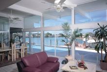 Interior photo of solar gard window tinting install on a waterfront home